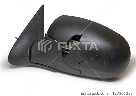 car exterior mirror, with broken plastic housing, showing inner adjusting elements, isolated on white background, with clipping path car exterior mirror, with broken plastic housing, showing inner adjusting elements, isolated on white background, with clipping path 127865352