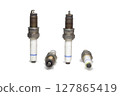 spark plugs kit, showing all sides, old, on white background, with clipping path 127865419