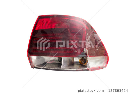 tail light of sedan body car. broken plastic lens. isolated on white background tail light of sedan body car. broken plastic lens. isolated on white background 127865424