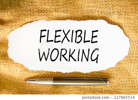 Flexible working symbol. Concept words Flexible working on beautiful white paper. Beautiful canvas background. Black pen. Business flexible working concept. Copy space. 127865514