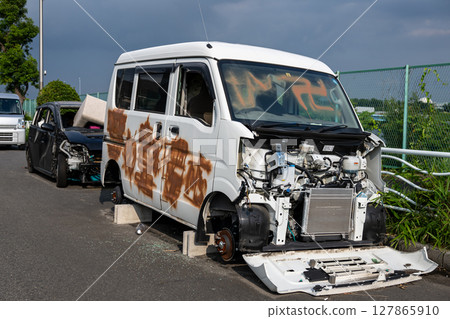 Abandoned vehicles on the road Abandoned vehicles on the road 127865910