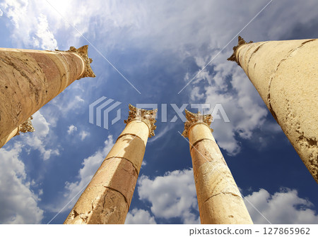 Roman Columns in the Jordanian city of Jerash (Gerasa of Antiquity), capital and largest city of Jerash Governorate, Jordan. Against the background of a beautiful sky with clouds 127865962