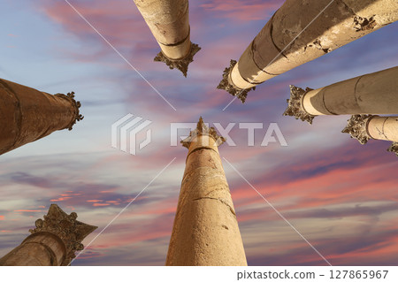 Roman Columns in the Jordanian city of Jerash (Gerasa of Antiquity), capital and largest city of Jerash Governorate, Jordan. Against the background of a beautiful sky with clouds 127865967