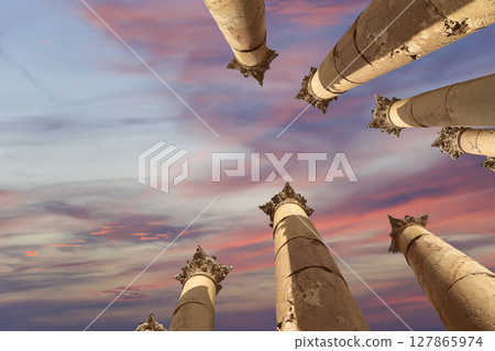 Roman Columns in the Jordanian city of Jerash (Gerasa of Antiquity), capital and largest city of Jerash Governorate, Jordan. Against the background of a beautiful sky with clouds Roman Columns in the Jordanian city of Jerash (Gerasa of Antiquity), capital and largest city of Jerash Governorate, Jordan. Against the background of a beautiful sky with clouds 127865974