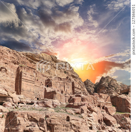 Mountains of Petra (against the background of a beautiful sky with clouds), Jordan, Middle East. Petra has been a UNESCO World Heritage Site since 1985 Mountains of Petra (against the background of a beautiful sky with clouds), Jordan, Middle East. Petra has been a UNESCO World Heritage Site since 1985 127866051