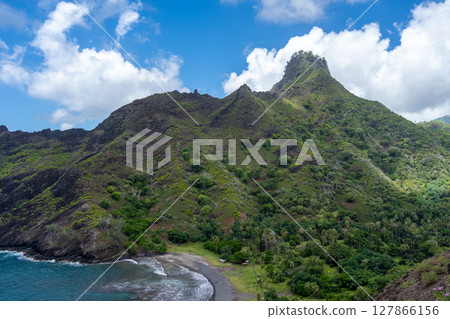 Coastal cliffs and turquoise bay near Puamau, Hiva Oa, Marquesas Islands, French Polynesia Coastal cliffs and turquoise bay near Puamau, Hiva Oa, Marquesas Islands, French Polynesia 127866156