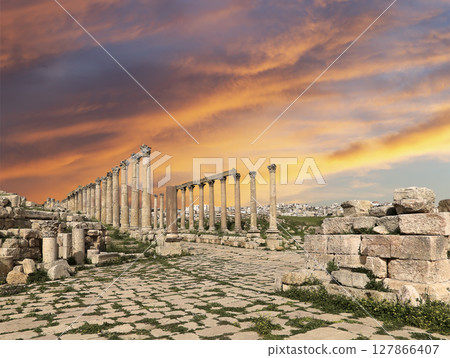 Roman Columns in the Jordanian city of Jerash (Gerasa of Antiquity), capital and largest city of Jerash Governorate, Jordan. Against the background of a beautiful sky with clouds 127866407