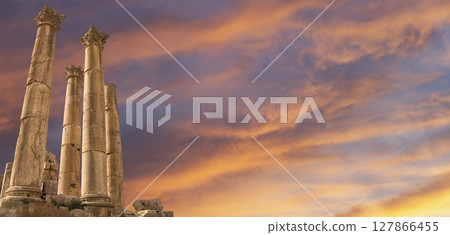 Roman Columns in the Jordanian city of Jerash (Gerasa of Antiquity), capital and largest city of Jerash Governorate, Jordan. Against the background of a beautiful sky with clouds 127866455