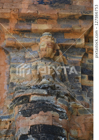 Fragment of ancient North Po Nagar Cham Tower with sculpture of 12 century in Nha Trang, Vietnam Fragment of ancient North Po Nagar Cham Tower with sculpture of 12 century in Nha Trang, Vietnam 127866753