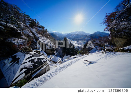 Winter mountain temple 127866896