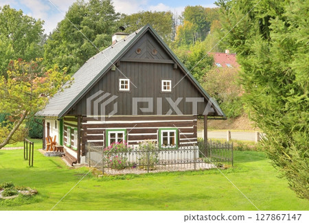 Beautiful wooden cottage in Czech republic Beautiful wooden cottage in Czech republic 127867147