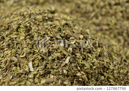 Dried Oregano Leaves Close-Up. Culinary Herb Background. 127867790