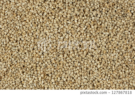 Uncooked White Quinoa Macro Top View. Natural Grain Background Uncooked White Quinoa Macro Top View. Natural Grain Background 127867818