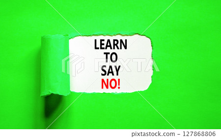 Learn to say no symbol. Concept words phrase Learn to say no on beautiful white paper. Beautiful green paper background. Business psychological Learn to say no concept. Copy space. 127868806