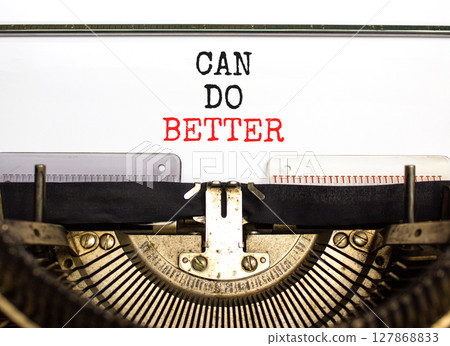 Can do better symbol. Concept words Can do better typed on beautiful old retro typewriter. Beautiful white paper background. Business and can do better concept. Copy space. 127868833