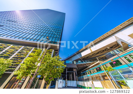 Tokyo cityscape in Japan, overlooking the World Trade Center Building South Tower and trains in front of Hamamatsucho Station Tokyo cityscape in Japan, overlooking the World Trade Center Building South Tower and trains in front of Hamamatsucho Station 127869322