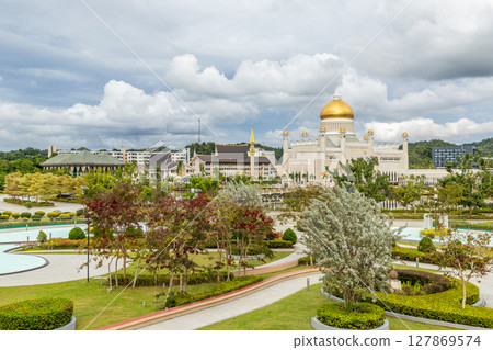 City central garden of Omar Ali Saifuddien Mosque golden domes and minarets with downtown in the background, Bandar Seri Begawan, Borneo, Sultanate Brunei Darussalam City central garden of Omar Ali Saifuddien Mosque golden domes and minarets with downtown in the background, Bandar Seri Begawan, Borneo, Sultanate Brunei Darussalam 127869574