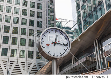 Contemporary Urban Clock in Business District with Modern Glass Office Towers Contemporary Urban Clock in Business District with Modern Glass Office Towers 127869891
