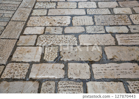 Old stone pavement texture background. 127870443