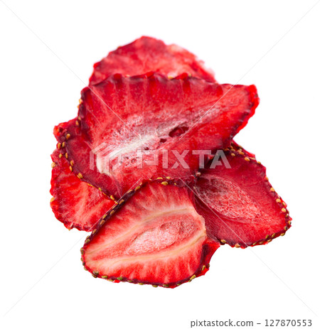 Dried strawberry slices isolated on white background. Dehydrated strawberries chips. Clipping path. 127870553