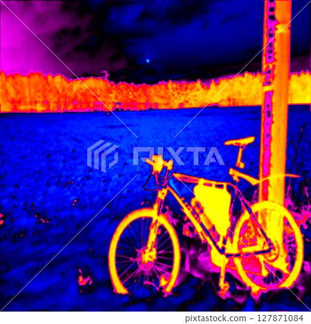 Mountain bike in snow, winter landscape. Thermal photography 127871084