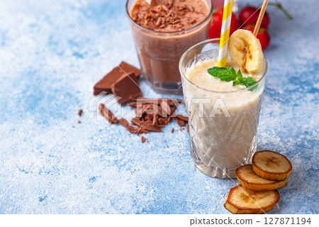 Milkshake from strawberry, banana and chocolate Milkshake from strawberry, banana and chocolate 127871194