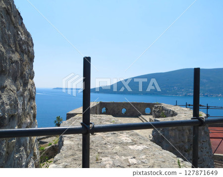 View of Kanli Kula Fortress Overlooking the Serene Bay of Kotor in Herceg Novi, Montenegro View of Kanli Kula Fortress Overlooking the Serene Bay of Kotor in Herceg Novi, Montenegro 127871649