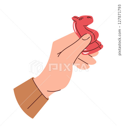 Human hand holding chess horse Human hand holding chess horse 127871793