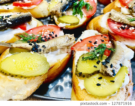 Tasty sandwiches with Riga sprats 127871916