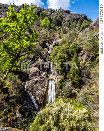 The beautiful Arado Waterfall, Cascata do Arado at the Peneda Geres National Park in Portugal, Europe The beautiful Arado Waterfall, Cascata do Arado at the Peneda Geres National Park in Portugal, Europe 127872610