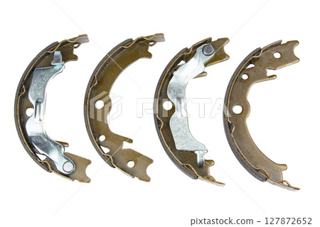 New brake pads for disc brakes on white New brake pads for disc brakes on white 127872652