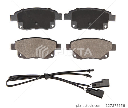 new brake pads on isolated white background new brake pads on isolated white background 127872656