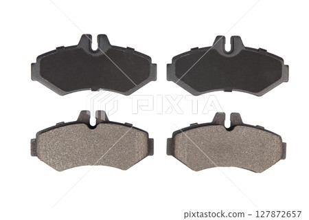 new brake pads on isolated white background new brake pads on isolated white background 127872657