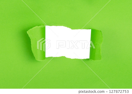 torn paper on white color background. Paper space for text. Ripped paper with empty space for writing in the middle 127872753