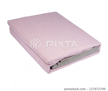 Linens set. Bedding set isolated on white. Set with stacks of clean bed linen on white background. 127872799