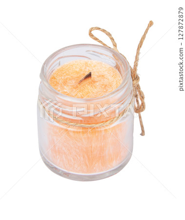 Beautiful candle with wooden wick isolated on white Beautiful candle with wooden wick isolated on white 127872879