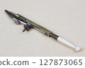 Vintage retro ruling pen on paper 127873065