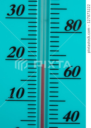 Atmospheric plastic meteorology thermometer isolated on white background. 127873222