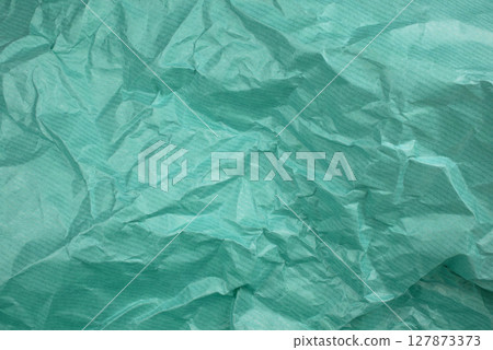 green crumpled paper for background 127873373