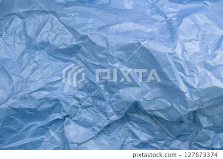 crumpled paper on the background crumpled paper on the background 127873374