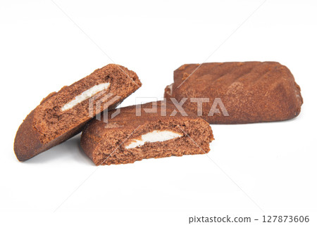 chocolate cookies with creme filing isolated on white background chocolate cookies with creme filing isolated on white background 127873606