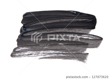 Black Watercolor. Abstract painted ink strokes set on watercolor paper. 127873620