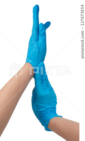 Doctor wearing blue nitrile gloves isolated on white background 127873654