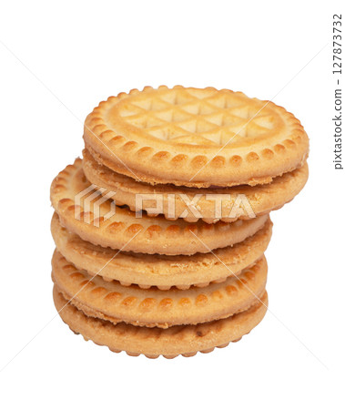 Tasty sandwich cookie with cream isolated on white Tasty sandwich cookie with cream isolated on white 127873732