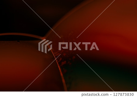 Red reflections of liquid in macro, red liquid surface, bubbles in macro, connection of bubbles in macro, cell from liquid, horror background Red reflections of liquid in macro, red liquid surface, bubbles in macro, connection of bubbles in macro, cell from liquid, horror background 127873830