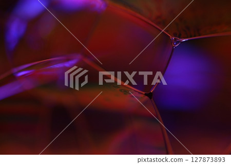 Purple and red liquid abstraction, phenomenal water forms, glossy glass background Purple and red liquid abstraction, phenomenal water forms, glossy glass background 127873893