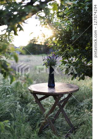 bouquet of sage on the table in the summer garden bouquet of sage on the table in the summer garden 127874294