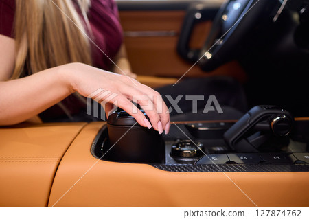 A Stylish Drink Container Perfect for Use in a Modern Car Interior, Both Functional and Fashionable A Stylish Drink Container Perfect for Use in a Modern Car Interior, Both Functional and Fashionable 127874762