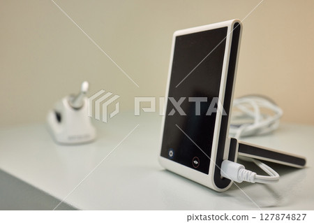 A Stylish Phone Stand, Perfect for Both Desk Use and Your Home Office Environment 127874827