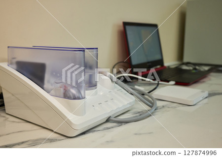 Advanced Imaging Equipment Placed on a Desk for Enhanced Functionality and Aesthetics 127874996